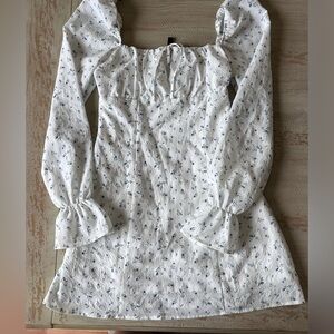 White and floral long sleeve mini dress